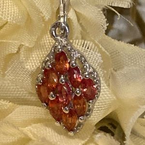 PRE-OWNED GENUINE .925 ORANGE SAPPHIRE NECKLACE. Worn only once or twice by me.